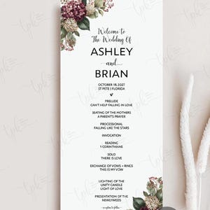 May include: A vertical wedding program card featuring a white background with floral arrangements of burgundy and cream hydrangeas in the top left and bottom right corners. The text reads Welcome to The Wedding Of ASHLEY and BRIAN, October 18, 2027, St Pete, Florida, and lists the ceremony order including prelude, processional, invocation, reading, solo, exchange of vows, unity candle, and presentation.