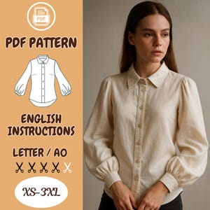 Puede incluir: Una camisa beige abotonada con mangas largas abullonadas. La camisa tiene un cuello clásico y está hecha de una tela clara. La imagen también incluye el texto "PDF PATTERN", "ENGLISH INSTRUCTIONS" y "XS-3XL".