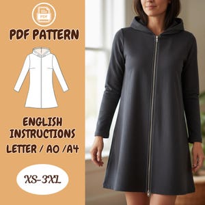 May include: A dark gray hooded dress with a full-length zipper, long sleeves, and a flared skirt. The image also includes a PDF pattern graphic with the text "PDF PATTERN", "ENGLISH INSTRUCTIONS", and "XS-3XL".