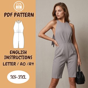 May include: A gray halter jumpsuit with a bow detail on the back. The image also features a PDF pattern with English instructions for sizes XS-3XL. The jumpsuit is knee-length and has a black handbag.