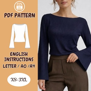 May include: Navy blue long-sleeve top with a boat neck and flared sleeves. The image also shows a PDF pattern with English instructions for sizes XS-3XL. The pattern includes instructions for Letter, AO, and A4 sizes.