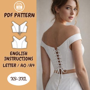 May include: White off-the-shoulder corset top with a lace-up back. The image also features a PDF pattern with English instructions for sizes XS-3XL. The top is part of a sewing pattern.