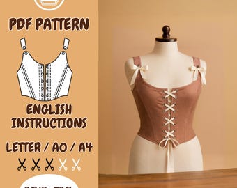 Pode incluir: Um espartilho castanho exibido em um manequim, com atacadores brancos e alças adornadas com laços brancos. A imagem inclui texto: "PDF PATTERN", "ENGLISH INSTRUCTIONS", "LETTER / AO / A4", e "XXS-5XL".