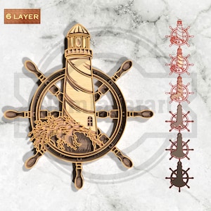 May include: A multi-layered wooden nautical-themed art piece featuring a lighthouse, ship's wheel, and waves. The lighthouse is beige and brown, with a dark brown ship's wheel. The text "6 LAYER" is in the upper left corner.