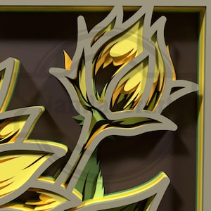 Puede incluir: Una obra de arte en papel en capas que presenta una flor amarilla estilizada con detalles en verde y dorado. La obra est&aacute; sobre un fondo marr&oacute;n oscuro con un marco marr&oacute;n claro, creando un efecto 3D. El dise&ntilde;o es intrincado y detallado.