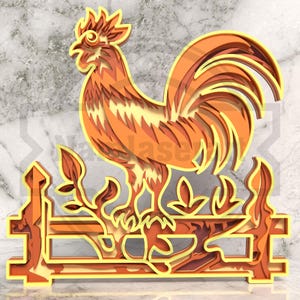 May include: A layered, three-dimensional rooster sculpture in shades of orange and yellow. The rooster is perched on a fence with leaves and branches. The artwork is likely made of wood or a similar material.