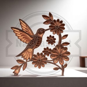 May include: A wooden hummingbird sculpture with outstretched wings, feeding from a flower. The sculpture is brown with detailed layering, and is perched on a branch with several flowers. The background is a neutral color.