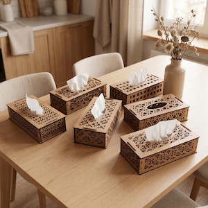May include: A collection of five rectangular wooden tissue box covers featuring intricate laser-cut geometric patterns on the top and sides. Each box is crafted from light brown wood and holds a stack of white facial tissues protruding from the center.