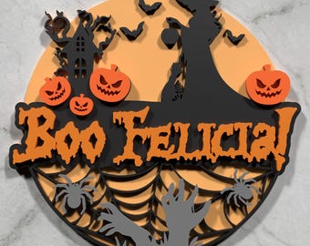 May include: A Halloween-themed decoration with an orange and black color scheme. The design includes a witch silhouette, pumpkins, bats, a haunted house, and the text "Boo Felicia!". A spider web and zombie hands complete the spooky scene.