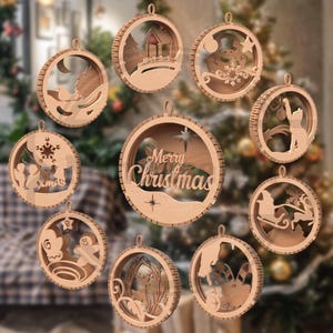 May include: A collection of nine wooden Christmas ornaments with various holiday-themed cut-out designs. The ornaments include images of Santa's sleigh, a snowman, a house, and the words "Merry Christmas". Each ornament has a circular shape.