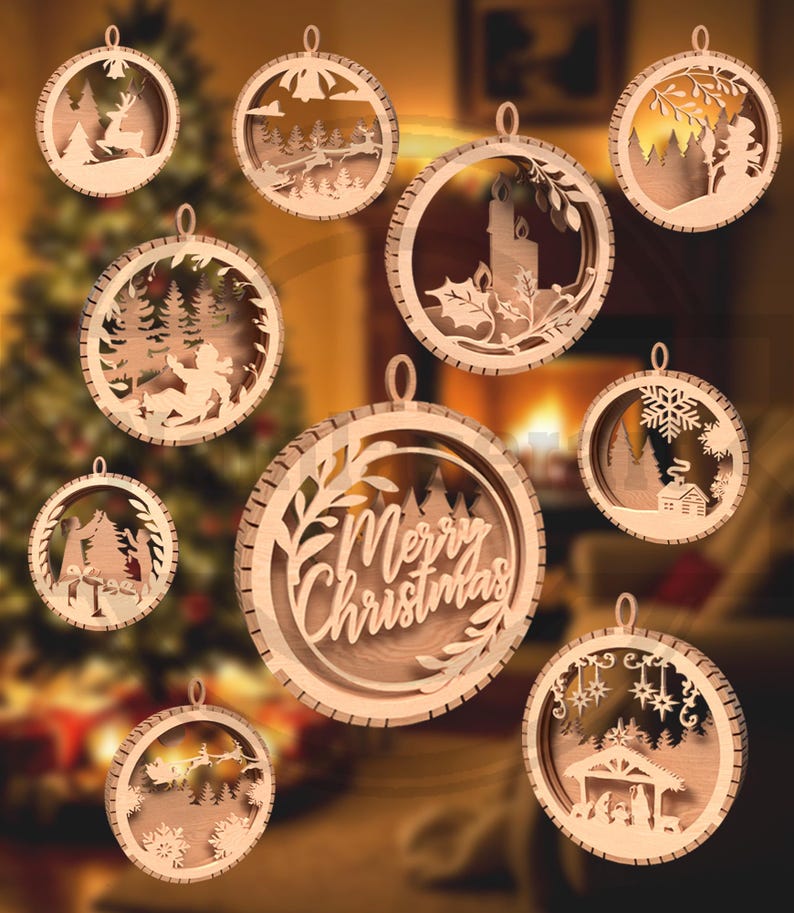May include: A collection of wooden Christmas ornaments with various designs. Each ornament is circular with a detailed cutout scene, including a reindeer, a forest, a candle, and the text "Merry Christmas".