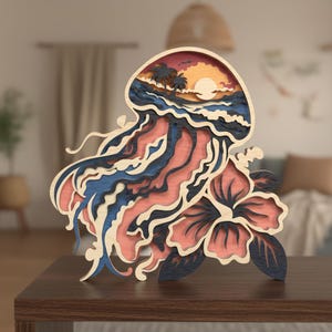 May include: A layered wooden art piece depicting a jellyfish, hibiscus flower, and a sunset scene. The jellyfish features pink, blue, and natural wood tones. The flower is pink and dark blue. The sunset includes palm trees and a yellow sun.