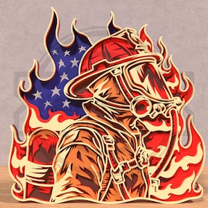 May include: A layered wood art piece depicting a firefighter in full gear, set against a backdrop of flames and the American flag. The artwork features a red helmet, breathing apparatus, and a detailed uniform. The flames are red, orange, and yellow.