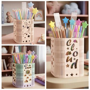 May include: Wooden pencil holders with decorative cutouts. One features a rocket, another the word "cloud", and the third has a sun design. Each holder is filled with pencils, rulers, and star-shaped toppers.