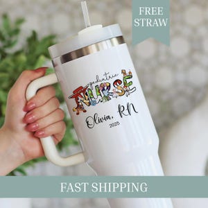 May include: White insulated tumbler with a handle, a lid, and a straw. The tumbler features the words "pediatric NURSE" in colorful letters with cartoon characters, the name "Olivia, RN", and the year "2025".