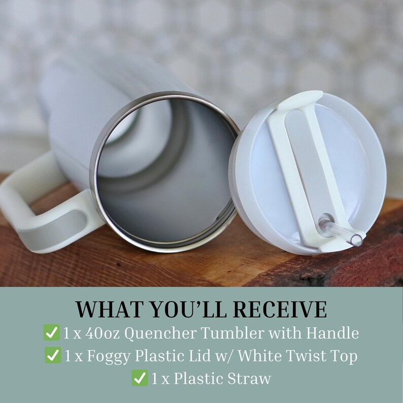 a white Quencher Tumbler with a handle and a white twist top, along with a white plastic lid and a white plastic straw.