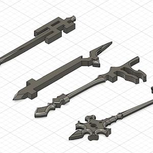 May include: Four different key-shaped metal objects with intricate designs. The keys are made of a dark gray metal and have a variety of shapes and sizes.