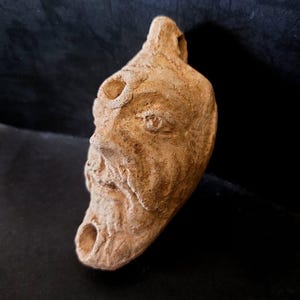 Ancient Roman Oil Lamp – Sculpted Face (1st–3rd century AD)