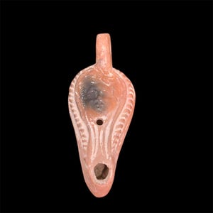 Ancient Roman Oil Lamp – Female Face & Workshop Mark (5th Century AD)