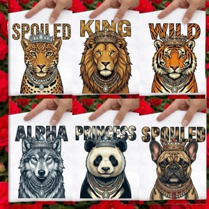 May include: Six white cards with animal illustrations wearing crowns and necklaces. The animals include a leopard, lion, tiger, wolf, panda, and bulldog. Text above each animal reads "SPOILED KING", "KING", "WILD", "ALPHA", "PRINCESS", and "SPOILED".