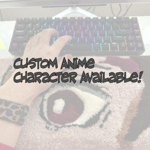 May include: A black mechanical keyboard with multi-colored keys is shown with a custom rug featuring an anime eye design. The text "CUSTOM ANIME CHARACTER AVAILABLE!" is displayed on the rug.