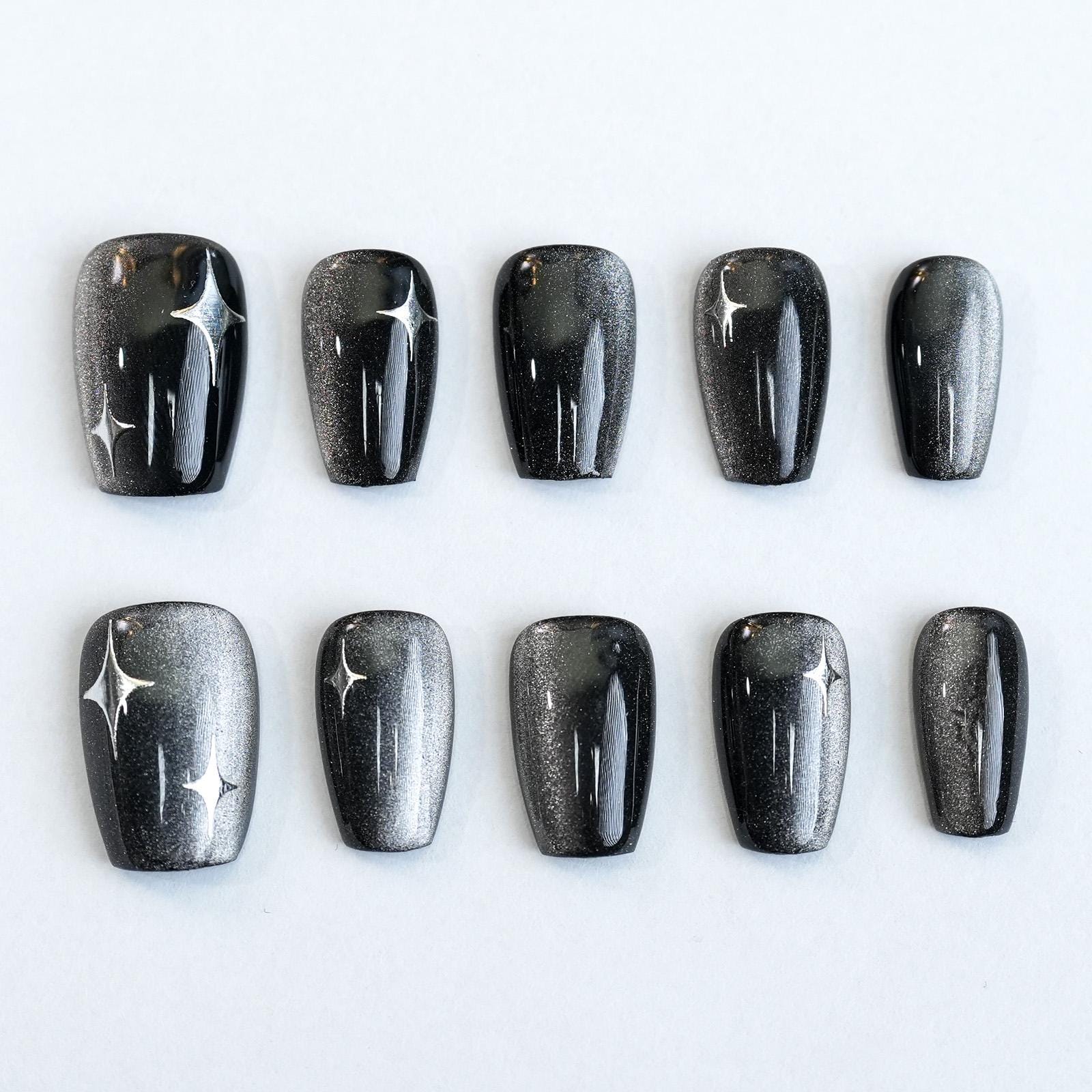 Futuristic Black Silver Nails That Shine
