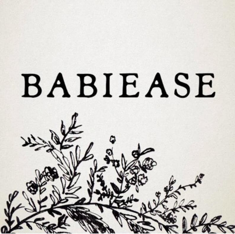 May include: A white rectangular graphic featuring the black text BABIEASE centered in the upper portion. Below the text, a black ink-style illustration of delicate leafy branches and small floral buds extends across the bottom edge of the frame.