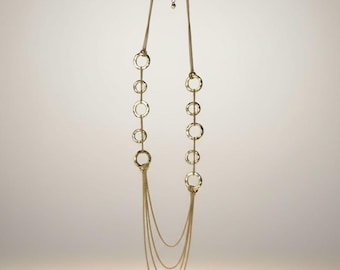 Gold Tone Ring Accents long Statement Necklace