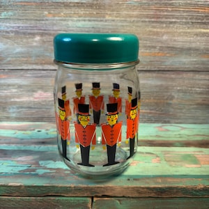 Vintage Nutcracker Soldier glass jar - green lidded container