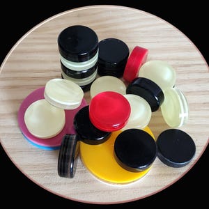 Carrom Board Strikers and coins Goti, with 2 large strikers for medium and larger Boards