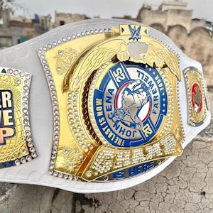 WWE John Cena Spinner Championship Belt | Replica Wrestling Title | &#39;The Champ is Here&#39; Collectible | White Strap Edition | Gift For You.