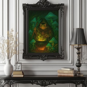 May include: A framed artwork shows a frog in a hooded robe, stirring a cauldron with a pentagram. The scene is set in a forest with glowing green mushrooms. The black, ornate frame adds a gothic touch to the fantasy art.