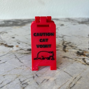 Caution Cat Vomit Sign