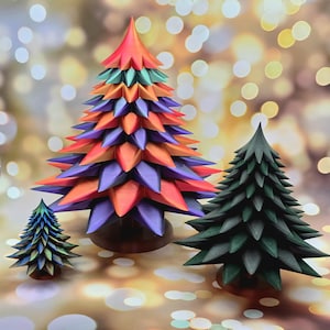 May include: Three decorative tree sculptures of varying sizes. The largest tree features a vibrant gradient of red, orange, purple, and teal layers. A smaller tree is solid dark green, and the smallest tree has a metallic blue and green finish.