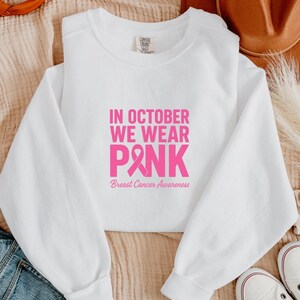 Cores confortáveis em outubro, usamos moletom rosa, moletom de conscientização sobre o câncer de mama, camiseta do esquadrão de apoio ao câncer de mama, fita contra o câncer de mama