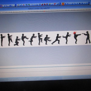 May include: A computer screen displaying a pattern of black silhouettes of zombies walking in a silly manner. The text "Pattern zombie silly walkPAT" is at the top of the screen.