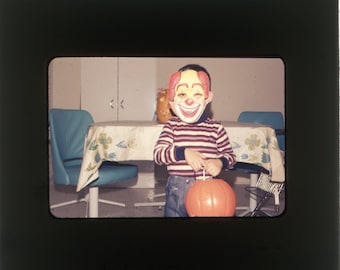 Digital Vintage Photo of Child in Mask with Pumpkin Halloween Clown