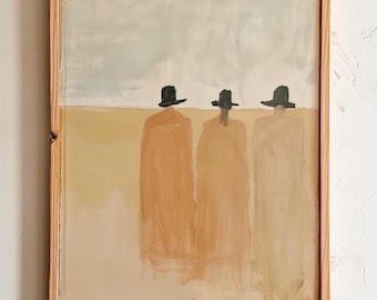 May include: Abstract painting in a wooden frame. The artwork shows three figures in hats and long coats, set against a backdrop of a muted landscape with beige and grey tones. The figures are painted in shades of brown.