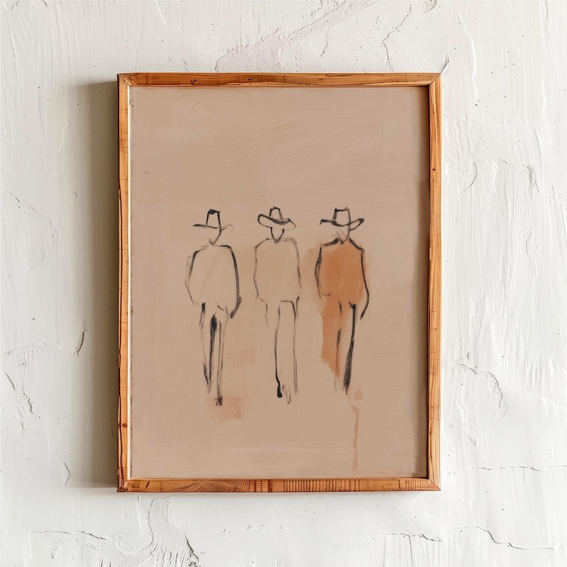 Puede incluir: Impresi&oacute;n art&iacute;stica abstracta que presenta tres figuras con sombreros de vaquero, esbozadas en negro sobre un fondo beige. La obra de arte est&aacute; enmarcada en un marco de madera natural. Las figuras se representan con l&iacute;neas simples y sombreado.