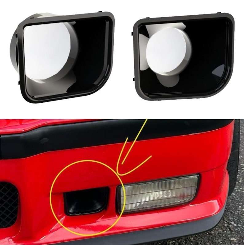 May include: Two black rectangular automotive air duct inserts with rounded corners and a smooth finish. Below, a red car bumper features a matching black air duct opening highlighted by a yellow circle and arrow, positioned next to a clear fog light.