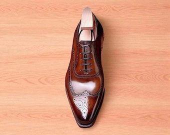 Handgemaakte bruine leren Oxford brogueschoenen: formele jurk met vleugeltip