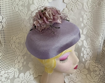 Vintage 1950's 1960's Hat Lavender Adorned With Light Purple Flowers On Top With A Tuft Of Netting *Original Caroline*