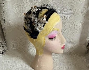 Vintage 1950's Hat Dark Blue With Veiling On The Top Of The Hat And Off White Flowers