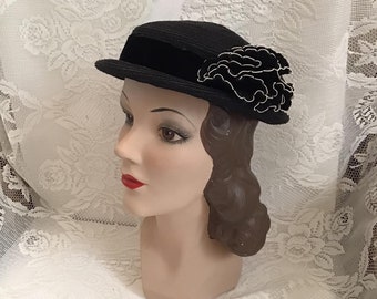 Vintage 1950's Hat Black Straw Adorned With A Fabric Decoration