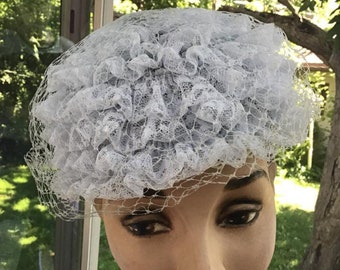 Vintage 1960s Hat Swirls And Layers Of Light Blue Lace With Veiling Pill Box Shape