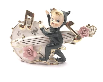 Vintage 1950's Figurine Made Of China Elf/Pixie Playing Cello Made In Japan Sold AS IS!!