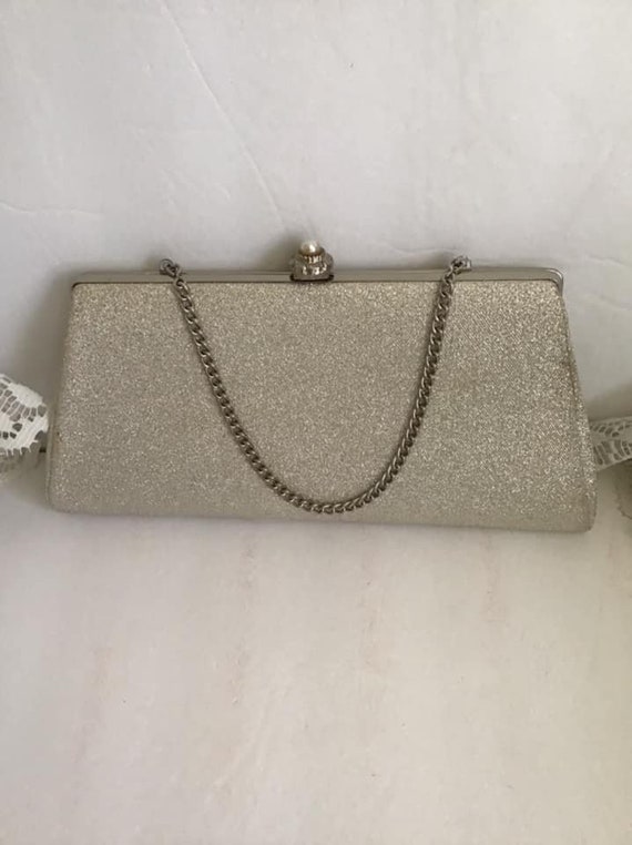 Shiny silver clutch sale