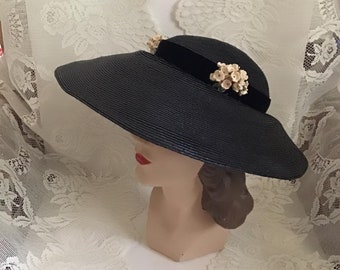 Vintage 1940's 1950's Hat Dark Blue Straw Hat Adorned With Flowers And Velvet Ribbon