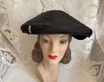 Vintage 1950's Hat Black Platter Style With Swirled Fabric Adorned With Rhinestones SOLD AS IS!