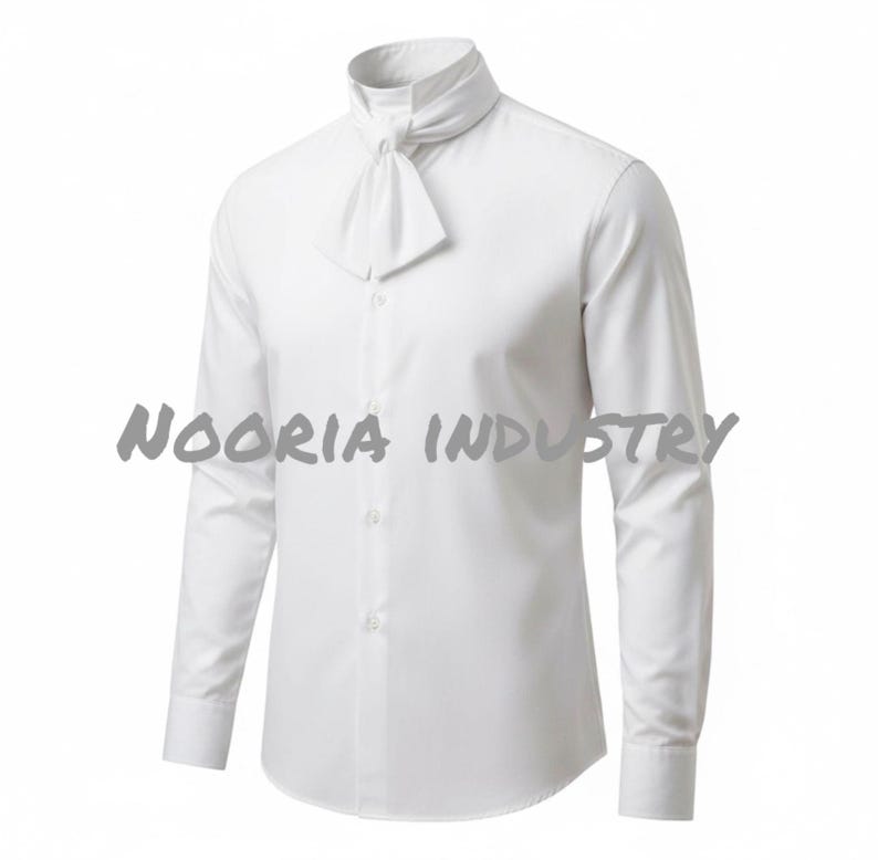May include: A white long-sleeve shirt with a high collar and attached necktie. The shirt has a button-down front and buttoned cuffs. The text "NOORIA INDUSTRY" is printed across the front of the shirt.